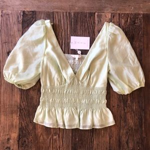WAYF green smocked crop v neck top with puff sleeve